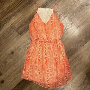 Orange print flowy mini dress